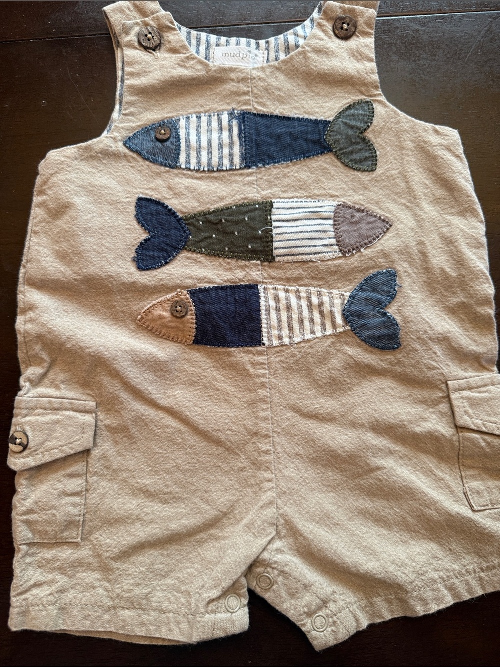 Mud Pie Tan Baby Romper with Navy, Olive and Cream Fish Appliqués